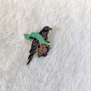 NWOT Bird Pin with the words "Solitude"